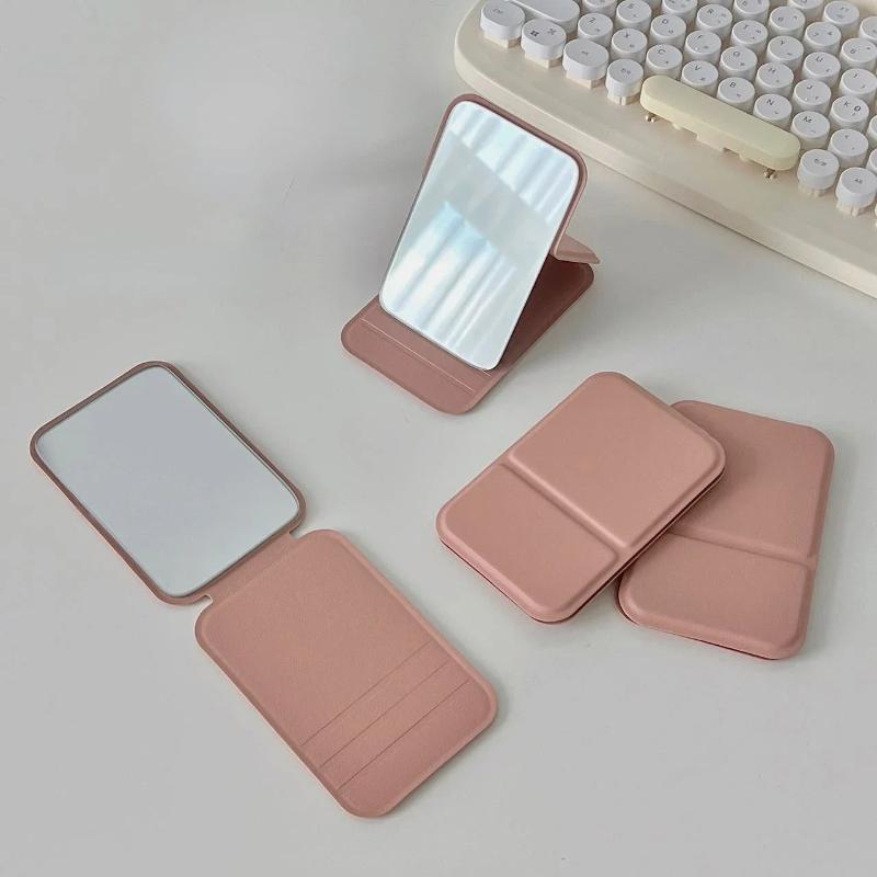 

Desktop Makeup Mirror Solid Color PU Leather Simple Portable Handheld Makeup Mirror Foldable Student Compact Cute Pocket Mirror 1 pc розовый