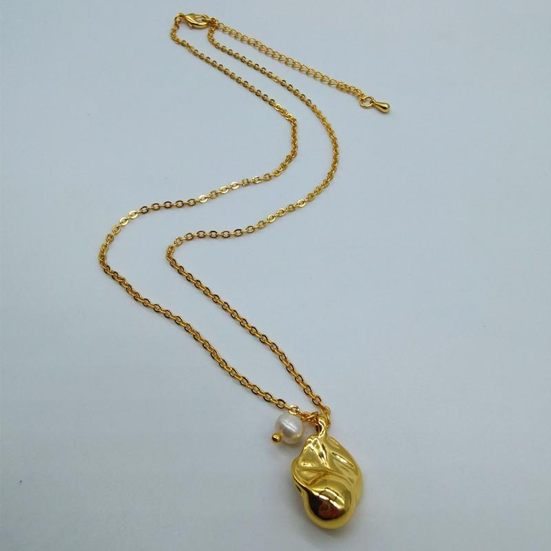 Meier Gold-plated brass faux freshwater pearl pendant necklace - elegant, minimalist, and versatile
