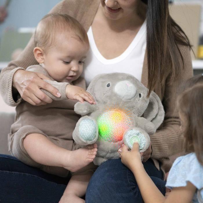 INGENUITY Doudou bébé lapin Sylvi, peluche, mélodies et vibrations apaisantes, lumineux, cadeau noel bébé