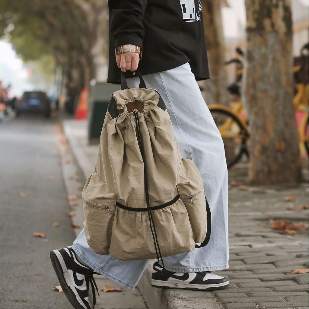 Casual Backpack Harajuku Solid Color Pleated Drawstring Waterproof Men'S And Women'S Mountaineering Travel Lightweight And Simple Niche
