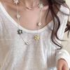 Erhai Flowing Clouds: Multi-use Metal Flower Patchwork Necklace with Clavicle Chain Design