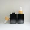 30ML Matte Frosted Black Glass Liquid Essential Oil Perfume Bottle with Reagent Dropper and Wood Grain Cap Packing Bottles