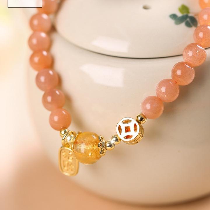 Sunstone bracelet for women, symbolizing the rising sun, love, and radiant light, with fragrant ash and glass beads