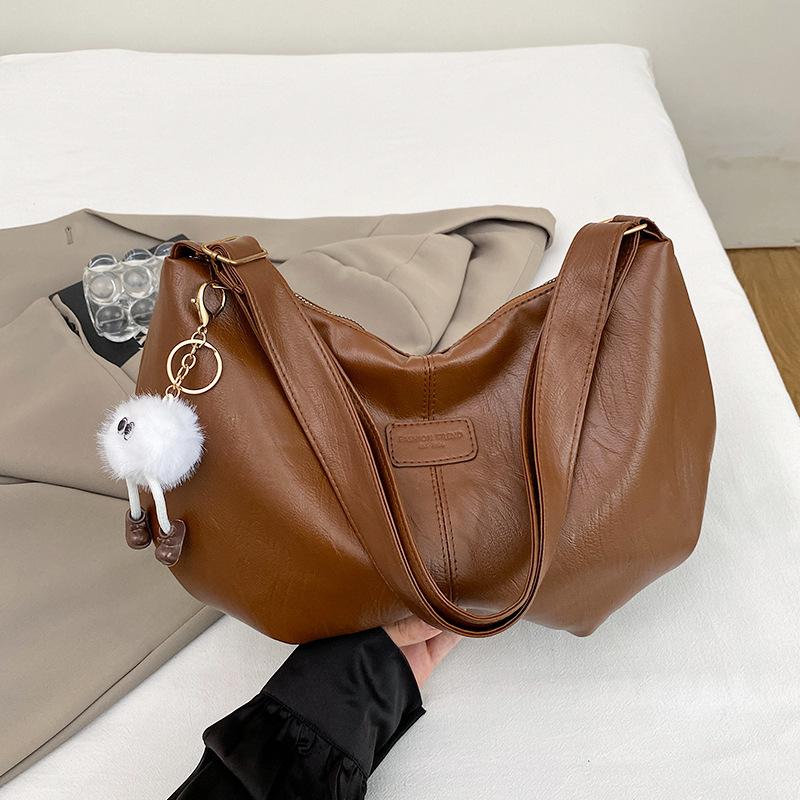 

Solid color high-end versatile tote bag women s new large-capacity simple commuter portable shoulder bag Without pendant коричневый