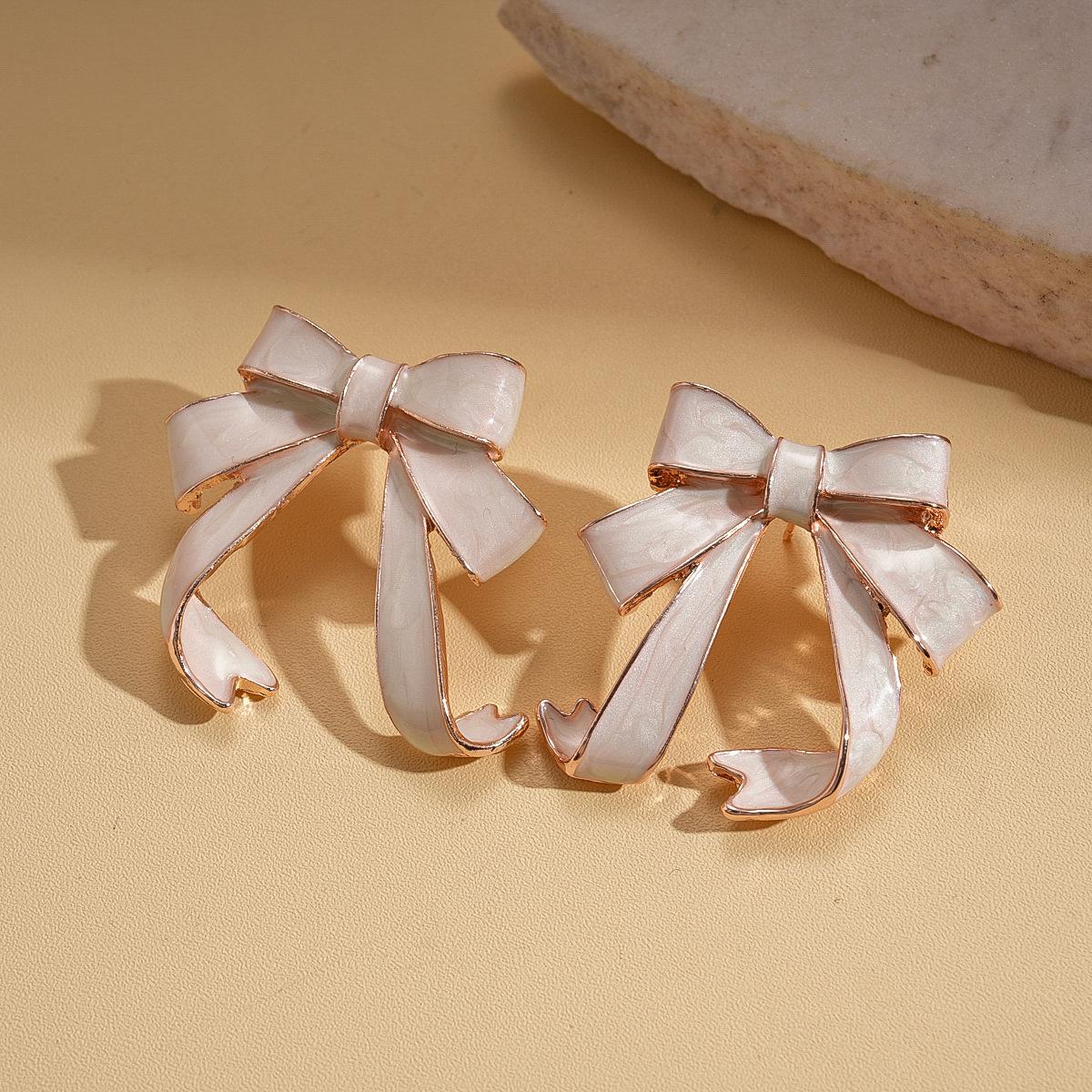 Wind drop oil bow silver needle stud earrings bohemian earrings