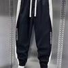 Men's Cargo Pants Sweatpants Drawstring Waist Joggers Pants with Pockets Letter Print Color Blocking