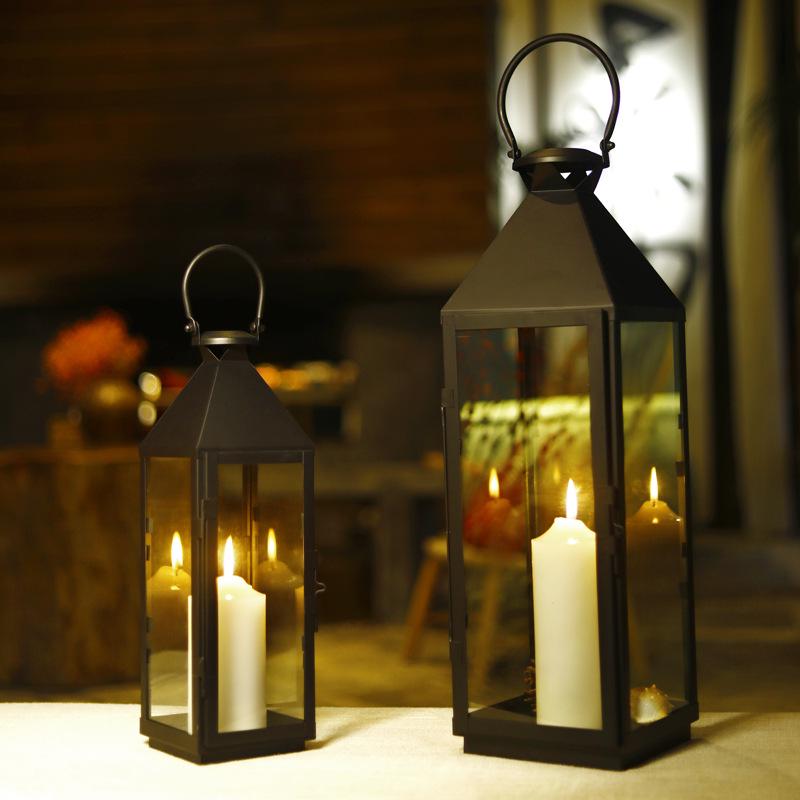 European-Style Wrought Iron Windproof Lanterns - Floor-Standing & Handheld Candlestick Ornaments for Weddings and Courtyard Decoration.