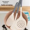 Grayish-white Silicone Kitchen Utensil Set: Non-stick Spatula, High-temp Resistant Ladle, Food-grade for Stir-fry and Soups.