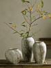 Wabi-Sabi Retro Chinese Ceramic Jar: Distressed Decorative Vase for Entrance, TV Cabinet, or Flower Arrangement.