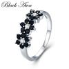 Anello romantico con fiore a tre petali Anello nero per donna