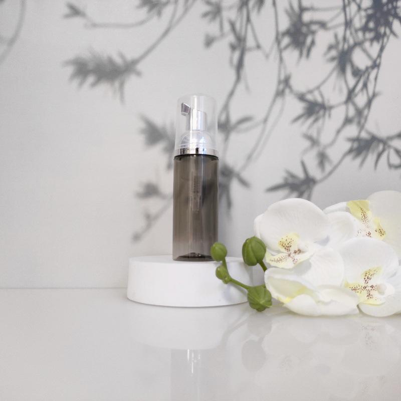 Available 60ml Transparent Black Foam Mousse Bottle for Face Wash and Travel-friendly Cosmetic Packaging.