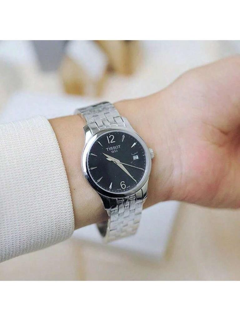 One Unit Available: Ultra-thin, Vintage-inspired Tradition Lady Design, Featuring Black Dial, Silver-tone Dauphine Hands, 316L T063.210.11.057.00