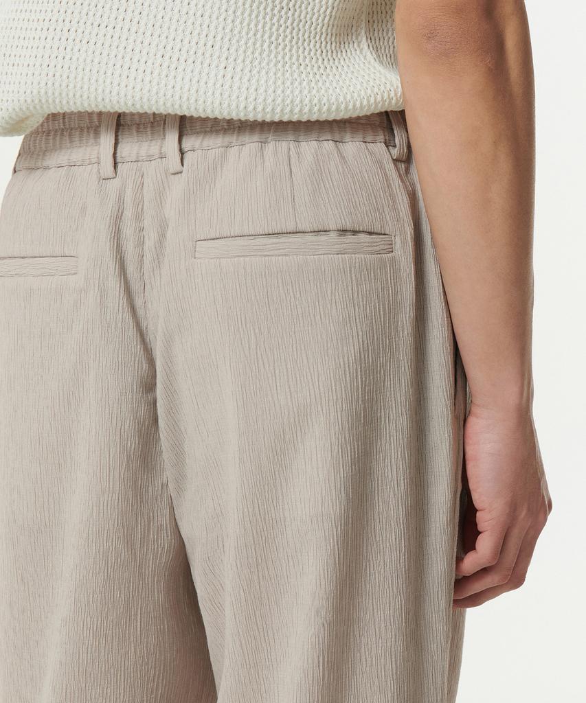 Musinsa Standard Crinkle One-Pleat Wide Elastic Pants [Light Beige]