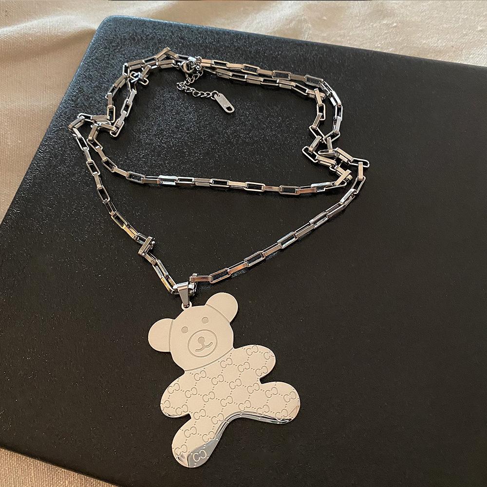 

Длинное ожерелье-свитер с медведем из титановой стали серебряный