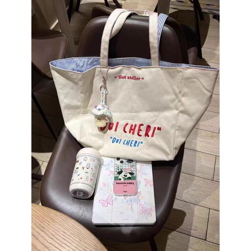 

Korean version niche design alphabet canvas bag women, new retro commuter versatile large-capacity shoulder tote bag білий