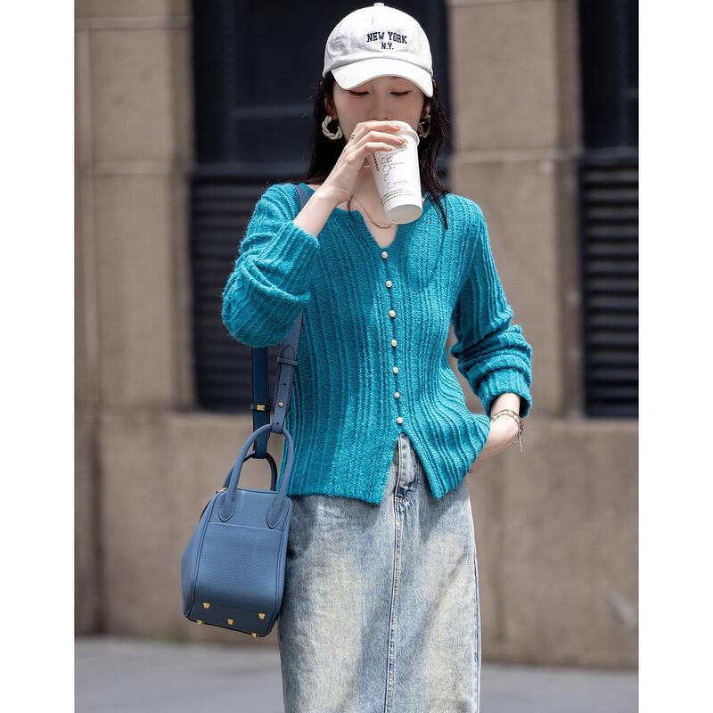 Damstickad tröja med rund hals i merinoullsblandning