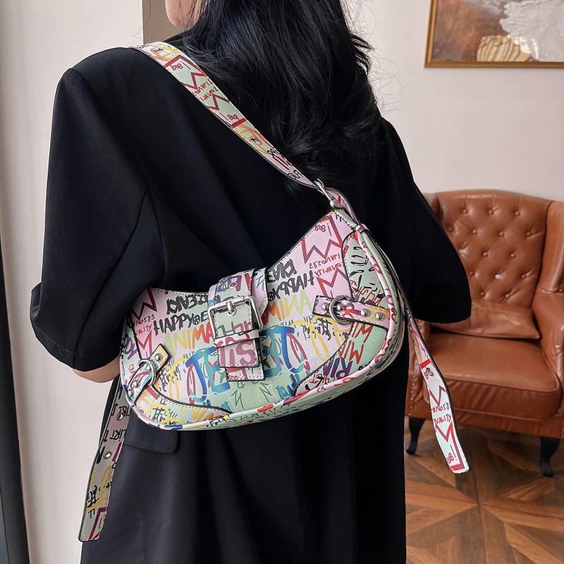 Internet-Berühmtheit Achseltasche 2025 neu Koreanische Version Mode Graffiti Buchstaben Umhängetasche ins Tide Damen Crossbody Knödeltasche