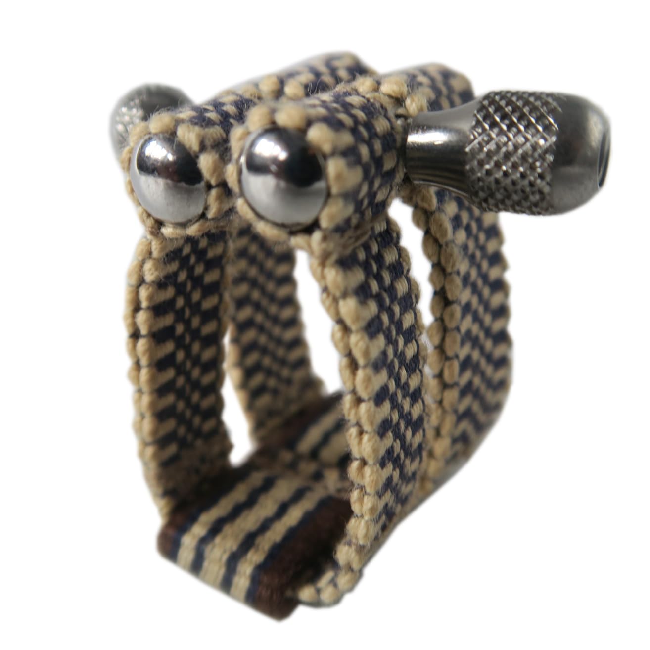 

Лигатура для кларнета SANADA из эбонита (Клетчатый и темно-коричневый)