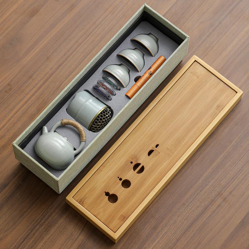 Dehua travel kung fu tea set small set household simple teapot ceramic teacup outdoor tea tray portable bag