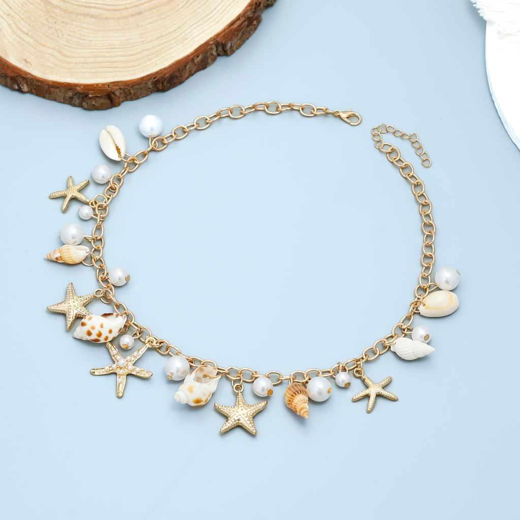 Single-piece beach seashell waist chain, faux pearl, starfish, and conch jewelry, a stylish accessory for beach vacations and pa