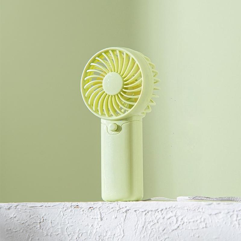 

Милый ручной вентилятор с подвесным шнурком Портативный мини-ручной вентилятор для настольного и уличного использования Карманный малошумный маленький электрический вентилятор зелёный