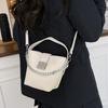 Premium sense popular portable bucket bag women's new niche fashion shoulder messenger bag commuter handbag