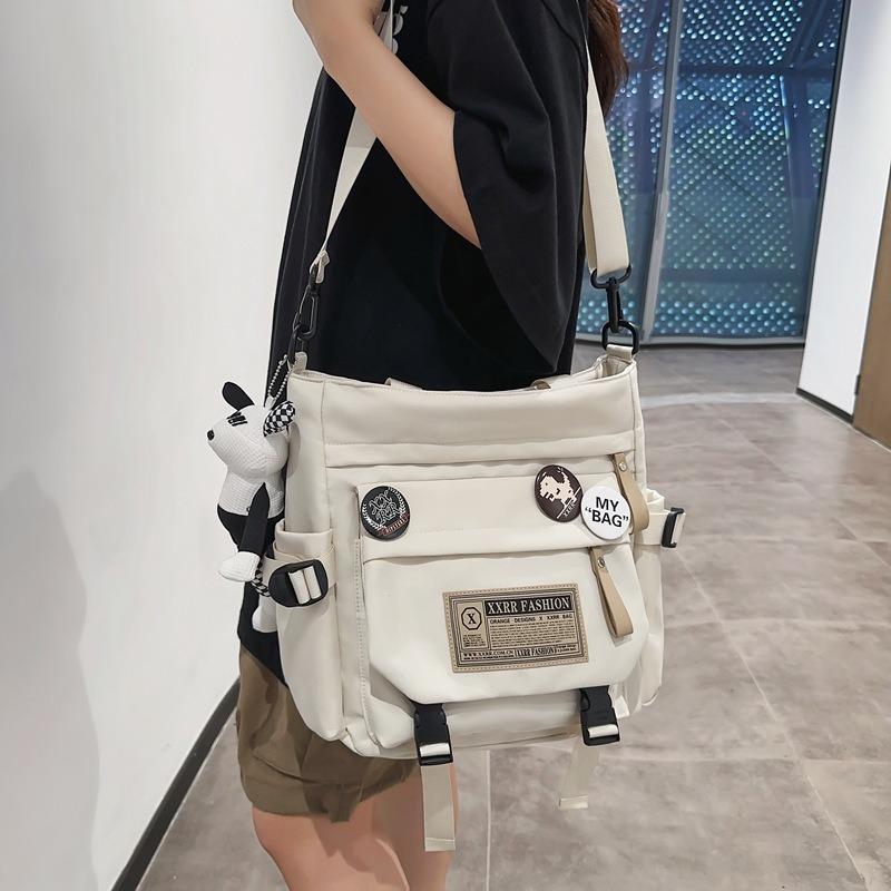 Japanese tooling retro shoulder bag female college students class commuter backpack large capacity portable tutoring bag messenger bag