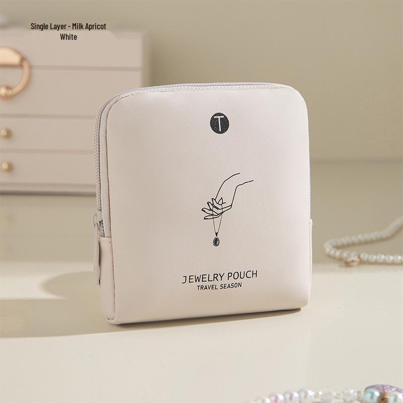 

Layered PU Leather Travel Jewelry Storage Bag for Earrings, Rings, and Bracelets with Pull-String Closure