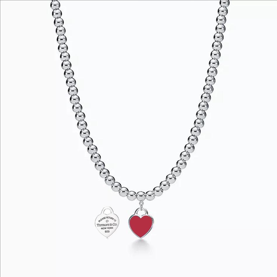 Heart-Shaped Enamel Cross Chain Necklace with Peach Heart Beads for Women - Fashionable Classic Style