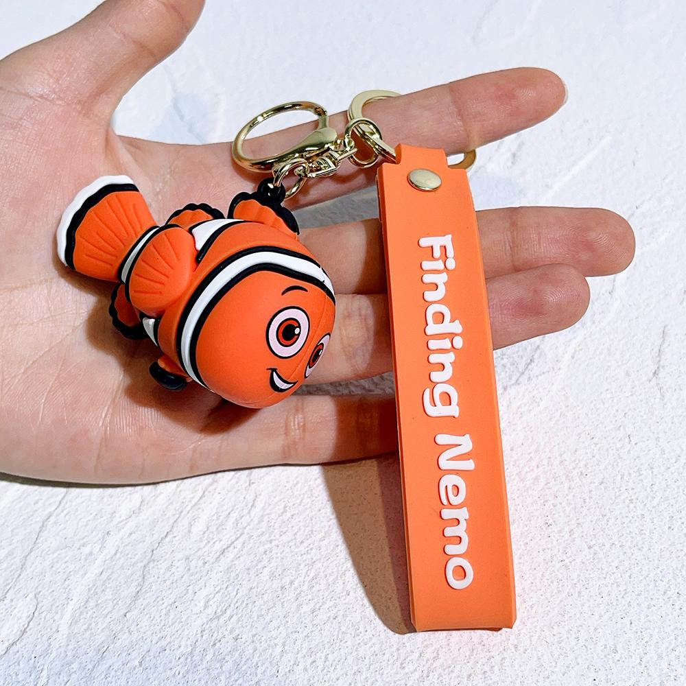 Llavero de Personalidad de Buscando a Nemo Dibujo Animado Pez Feo Nemo Dory Llavero Colgante Encanto para Bolso Accesorios para Llaves de Coche Juguetes Regalos