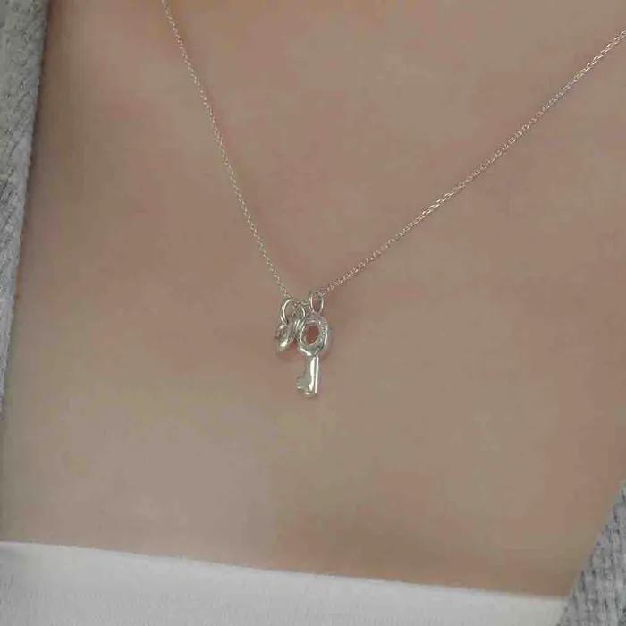key + hole necklace