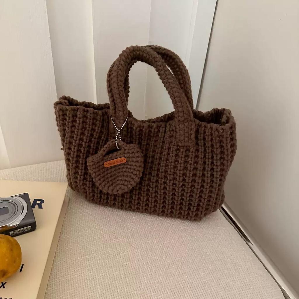 Summer super fire woven bag women's new literary and artistic style wool knitted vacation beach bag shoulder messenger bag