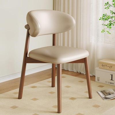 Nordic Modern Minimalist Solid Wood Dining Chair with Designer Backrest and Italian Light Luxury Deer Horn Design.