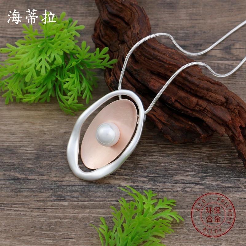 New hollow brushed geometric oval long pendant, women's simple and advanced irregular oval long necklace