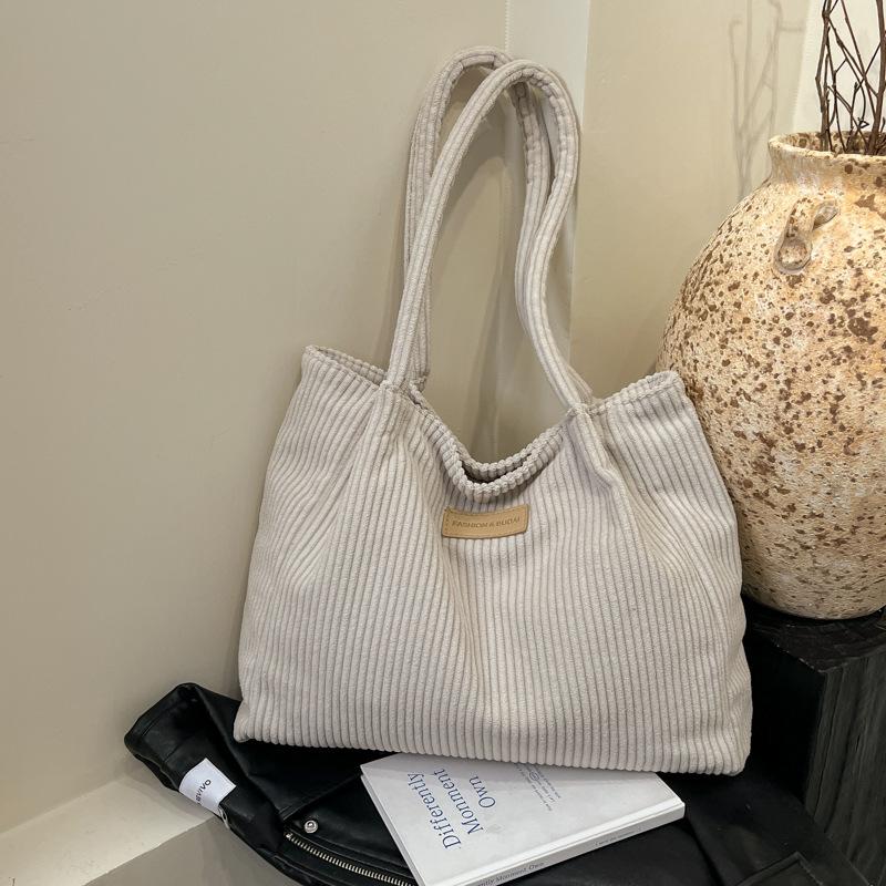 This year's popular fashion Korean version of solid color handbag 2025 early spring new foreign style shoulder underarm bag tote bag women