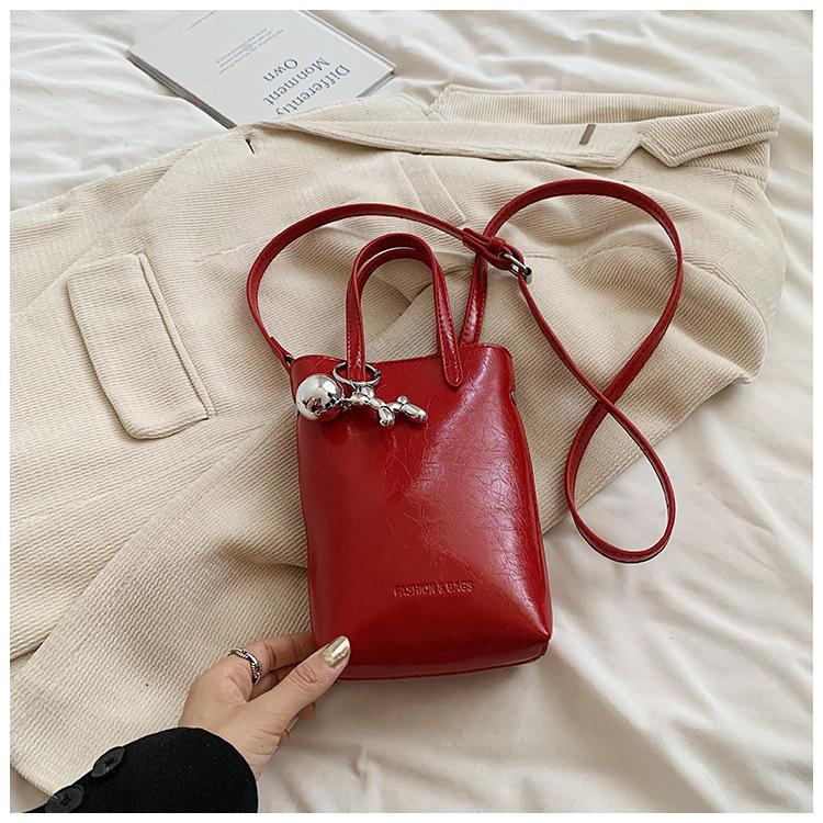 

Small bag women s spring 2025 new fashion shoulder messenger bag texture foreign style work hand carry small bucket bag