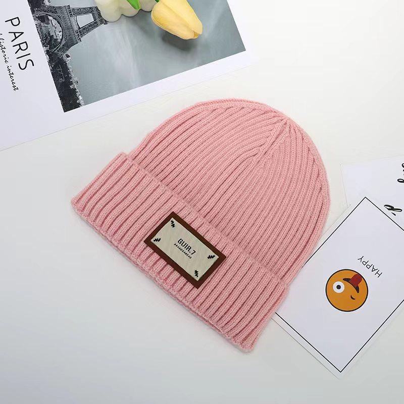

Embroidered pullover knitted elastic wool hat for men and women casual autumn and winter warm ear protection cold thickened hat One size рожевий
