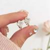 Cold wind simple hollow flower ear buckle light luxury niche design high-end earrings exquisite fashion temperament earrings