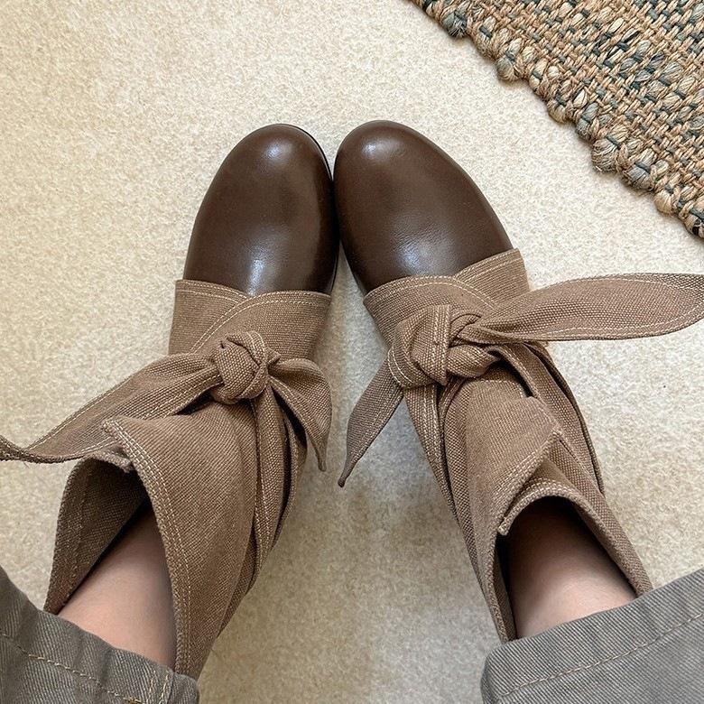 Versatile new flat-bottomed retro splicing women's boots round head rad autumn bow fashion beauty short boots women's short tube