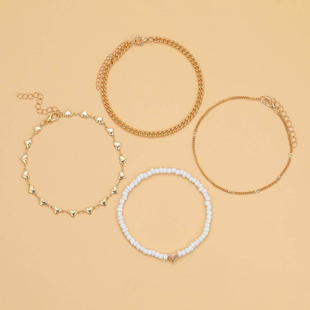 4 szt. Zestaw łańcuszków na kostkę dla kobiet wielowarstwowy metalowy łańcuszek w kształcie serca koralik Retro plaża łańcuszek na kostkę biżuteria prezenty