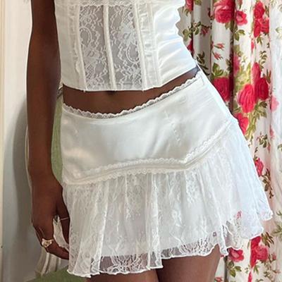 Jupe courte plissée à volants en dentelle taille basse pour femme, jupe courte à ourlet fleuri fluide en A