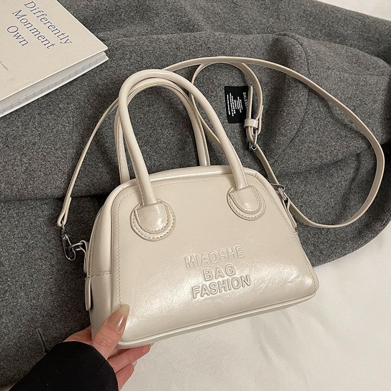 Spring and summer new products niche INS style simple portable pillow bag Korean version commuting versatile fashionable shoulder messenger bag