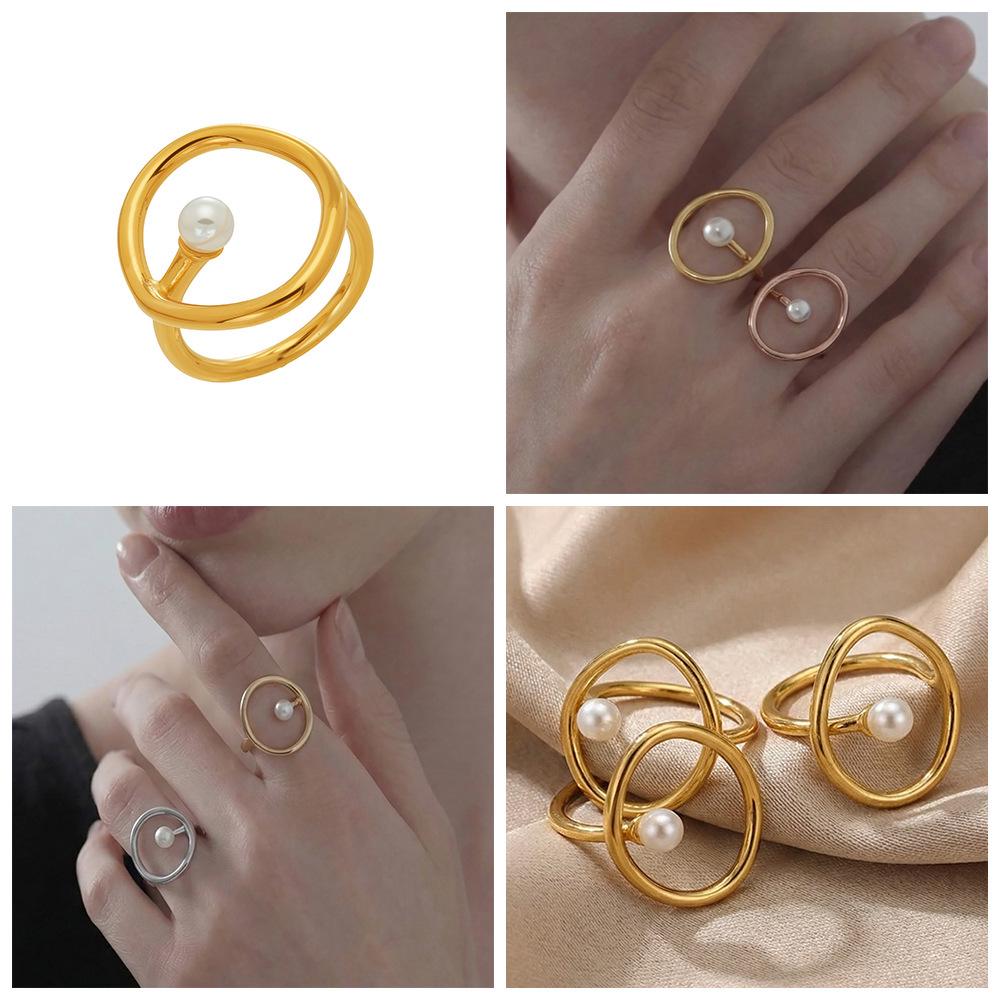 Geometrischer Ring aus Edelstahl mit 18 Karat Vergoldung und Kunstperle
