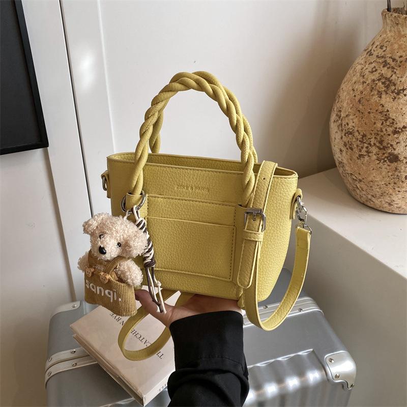 Stylish and simple interwoven rope hand withdrawal bucket bag simple casual texture bag daily versatile shoulder messenger bag