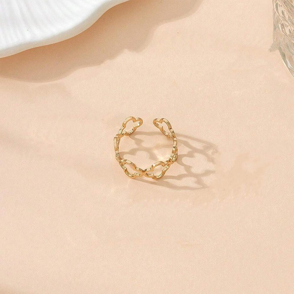 DOTIF Stainless Steel Lucky Hollow Four-Leaf Clover Ring Female Fashion Simple Opening Adjustable Finger Jewelry Party Gifts