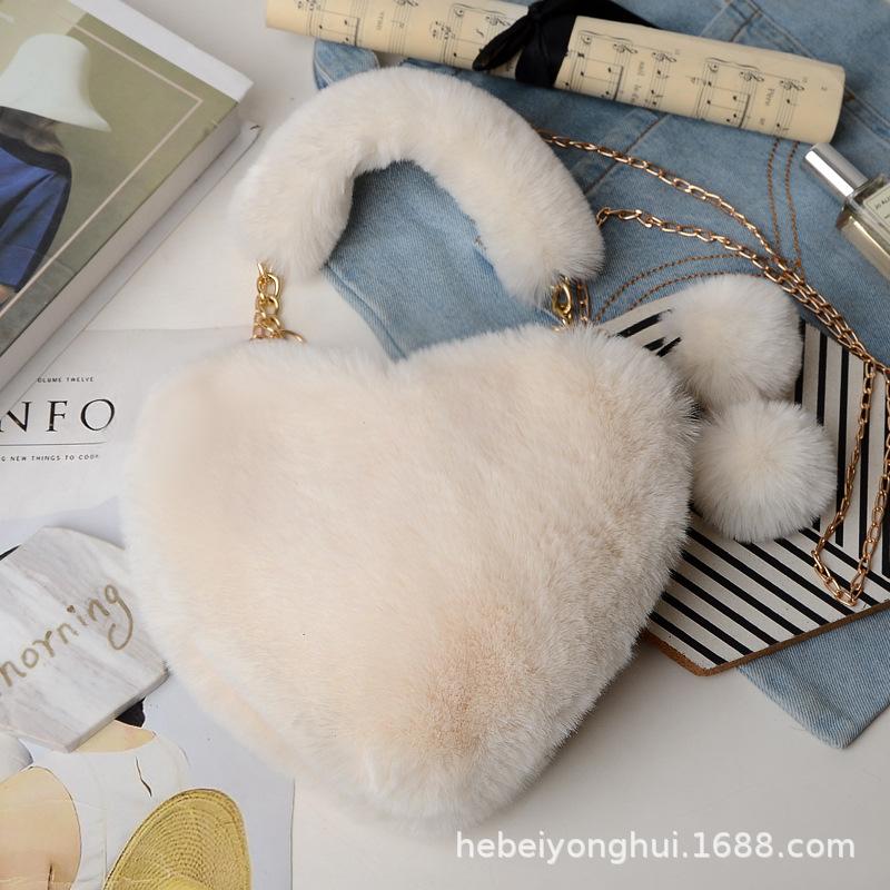 Herbst und Winter neue tragbare Liebeswolle Tasche Mode Kette Umhängetasche Plüschtasche Herztasche rote Fell Strohtasche Handtrage