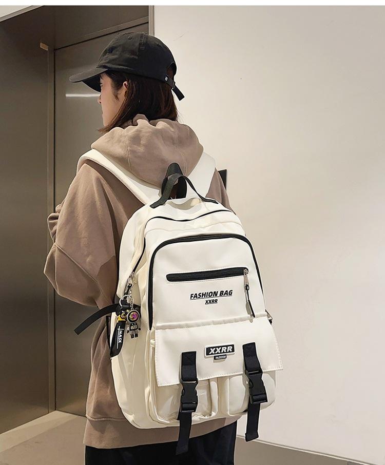 Schoolbag men's and women's high school students' large-capacity backpack, leisure travel, junior high school students' dirt-resistant