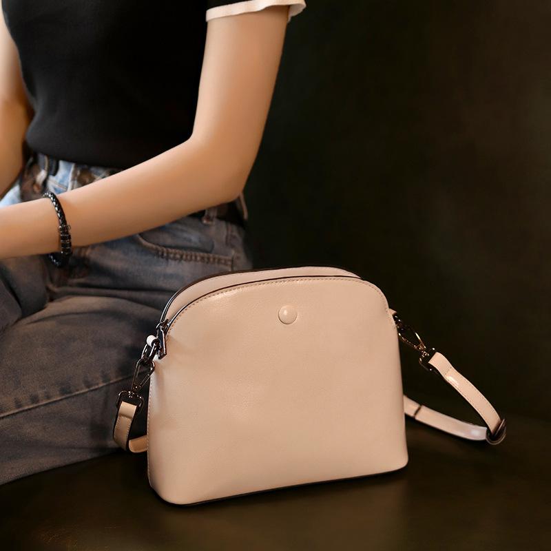 

Spring and summer new niche mobile phone bag fashionable versatile simple portable shoulder messenger bag casual oil wax leather bag