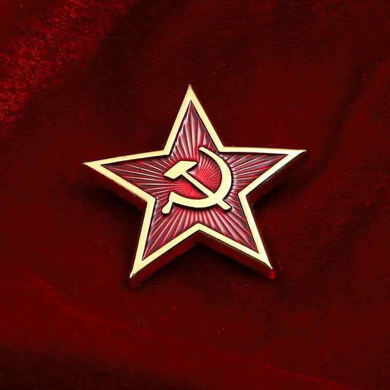 

Советская брошь «Серп и молот», двуглавый орел, звезда