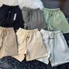 Pantalones cortos reflectantes de doble línea para hombre, verano, pantalones de cinco puntos, estilo urbano, holgados, color sólido, simples, casuales